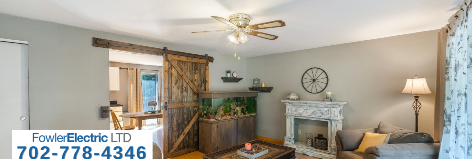 ceiling fan in room with eclectic decorations over lay says fowler electric ltd 702-778-4346
